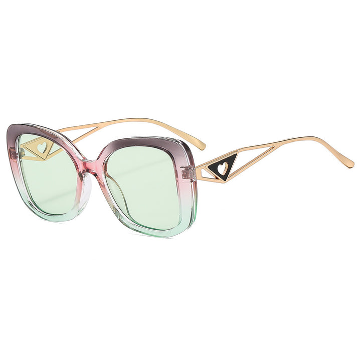 Ladies fashionable oversized sunglasses with luxurious heart detail Bowlift