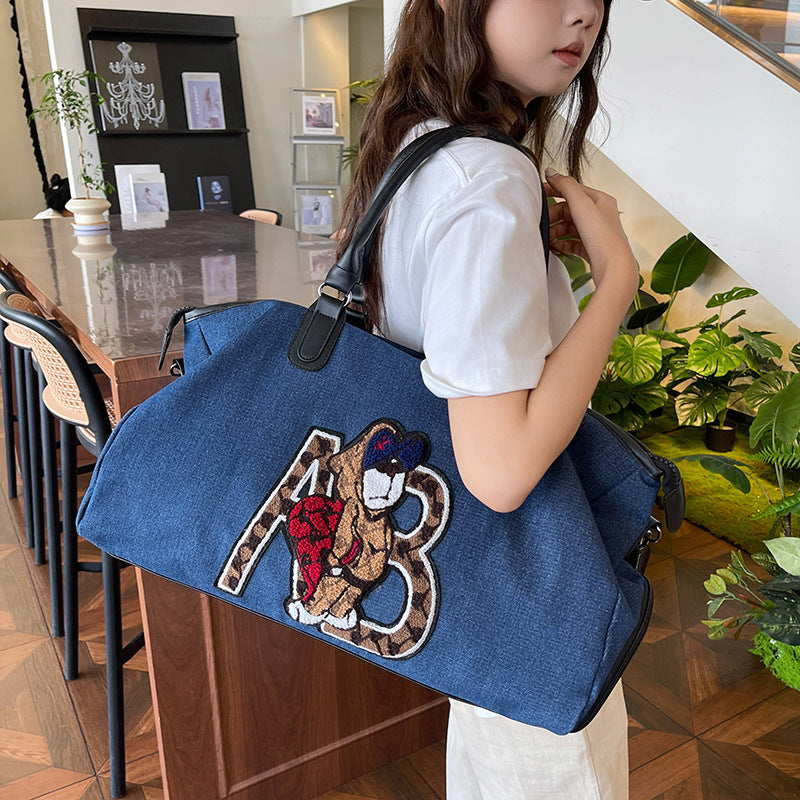 Embroidered Animal Print Weekend Duffle Bag