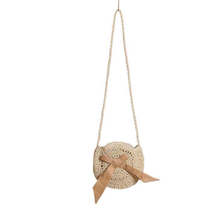 Handwoven shoulder bag with decorative bow accent Bowlift