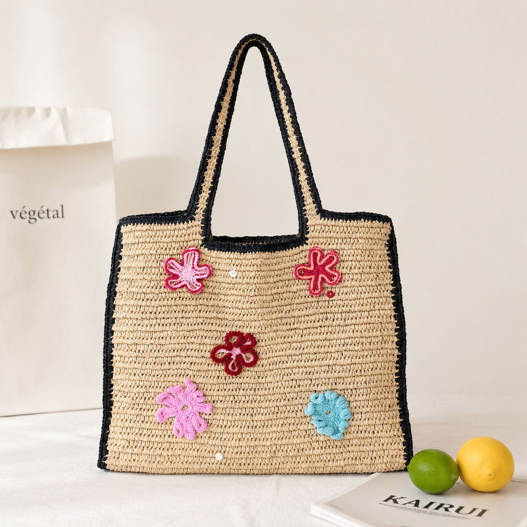 Handmade straw bag with flower appliqués Bowlift