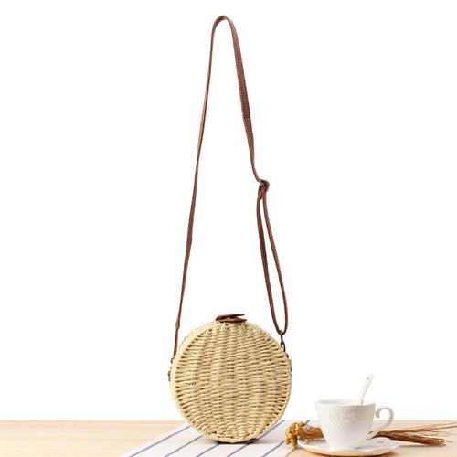 Round basket bag with leather accents Bowlift
