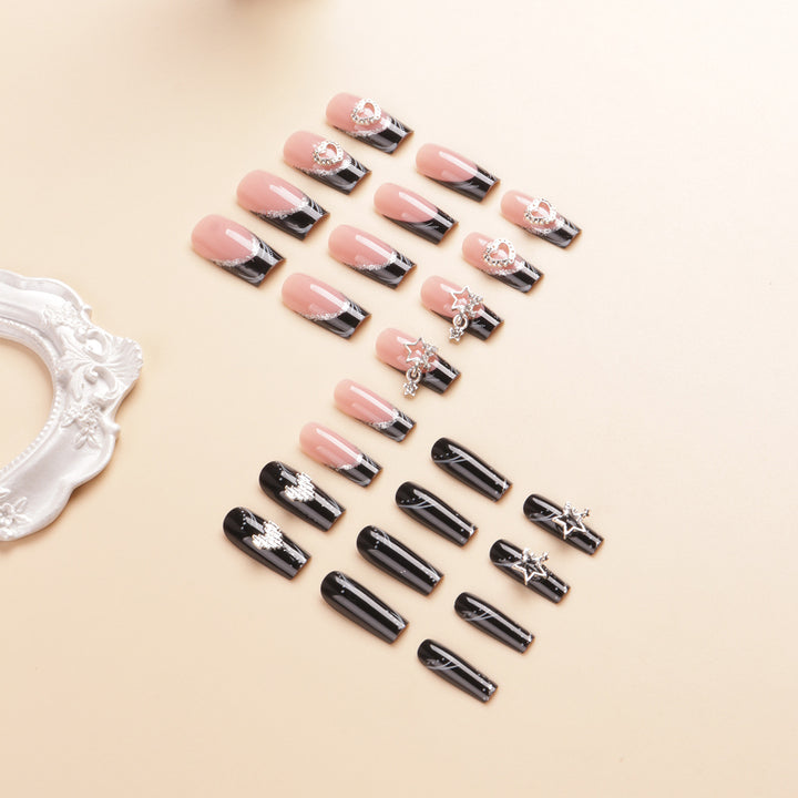 Artistic Long Press-On Nail Design with Rhinestone Accents Bowlift