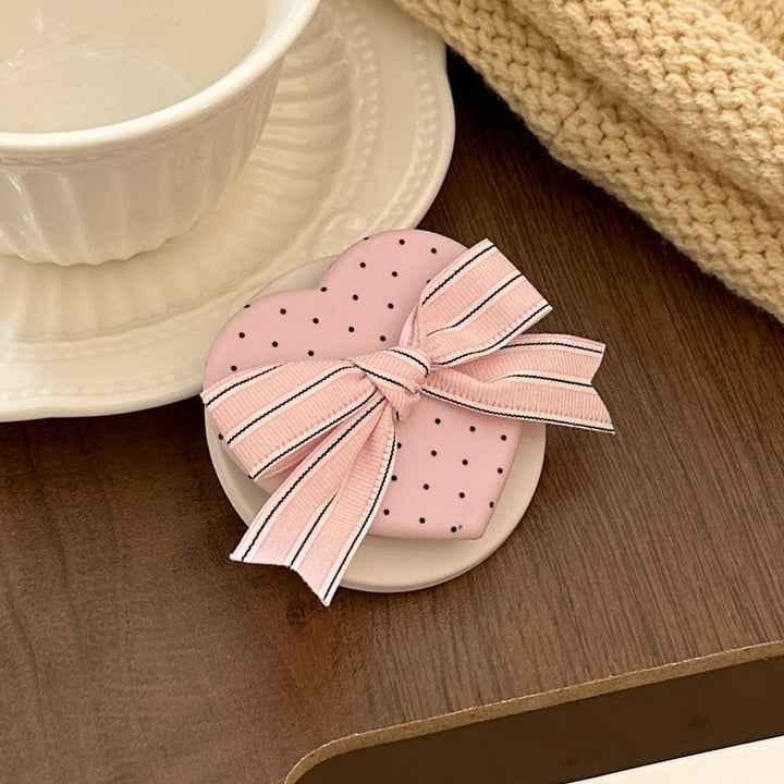 Heart-shaped cosmetic box with bow motif Bowlift