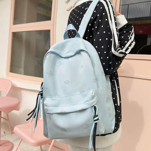 Fashionable backpack with shimmering butterfly design Bowlift