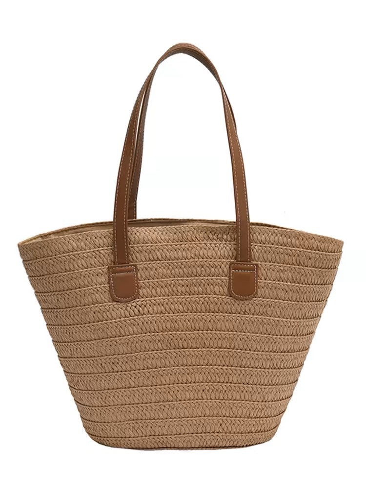 Stylish beach bag made of woven natural material with leather handles Bowlift