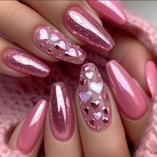 Artificial nails with romantic heart design and fine accents Bowlift