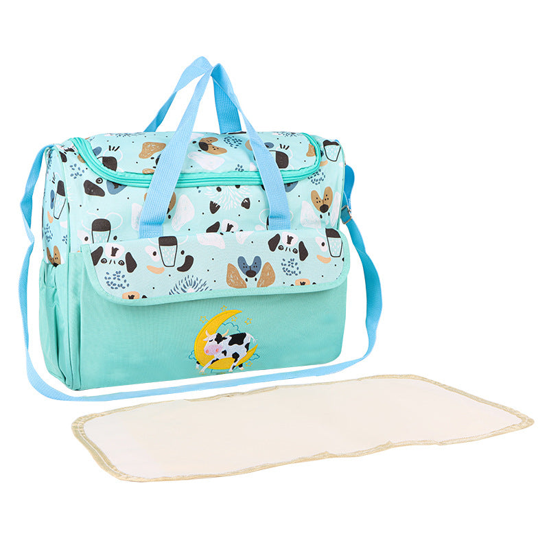 Multifunctional diaper bag with integrated changing mat Bowlift