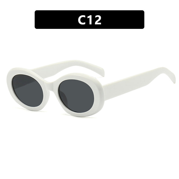 Women's fashionable sunglasses in original oval design with transparent frame and UV protection Bowlift
