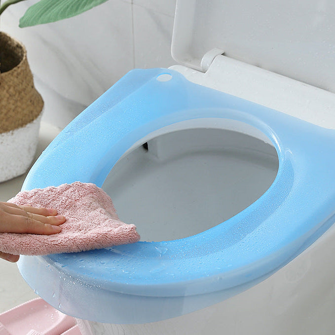 Padded toilet seat reducer with non-slip grips Bowlift