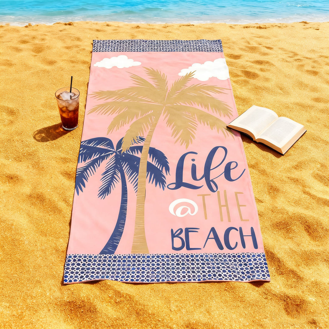 Beach towel with tropical palm leaf pattern Bowlift