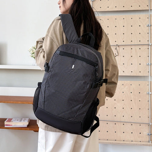 Practical backpack with multifunctional mesh side pockets Bowlift