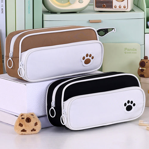 Pencil case with double compartment design and playful paw print motif Bowlift