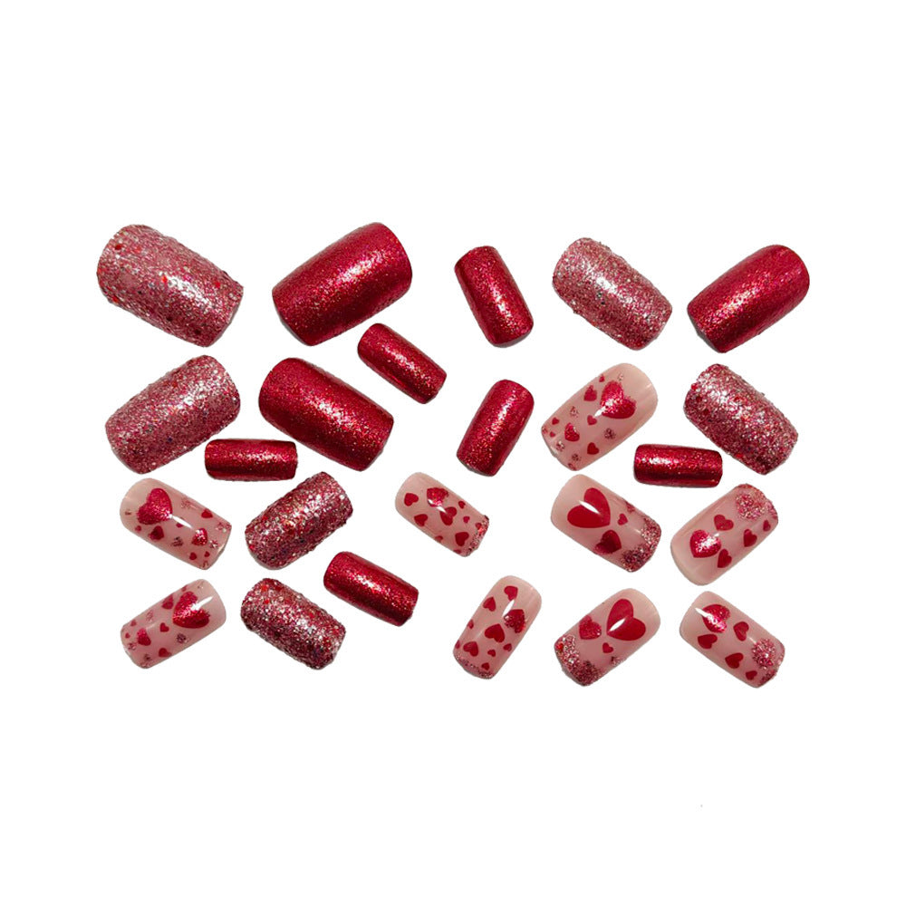 Artificial nails with heart design and glitter Bowlift