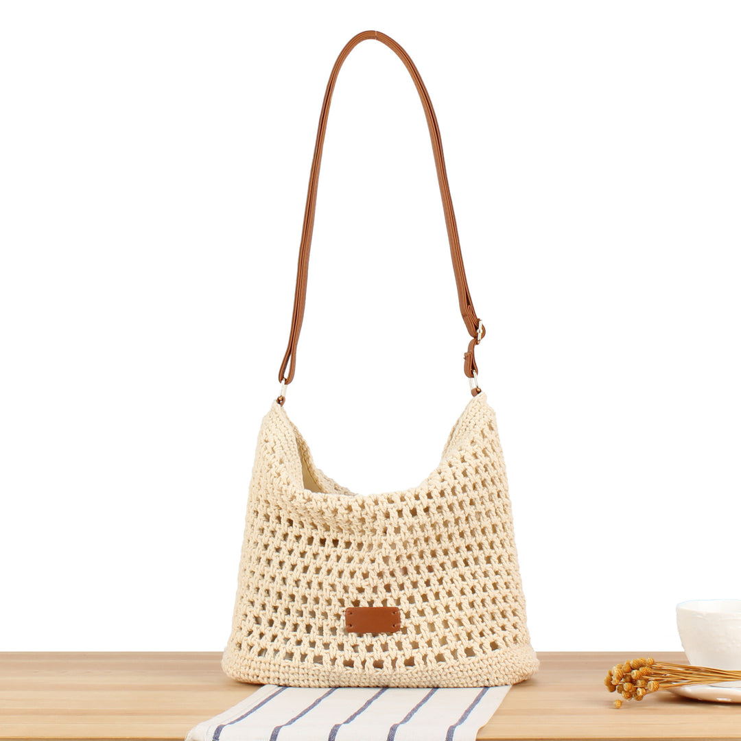 Handbag made of hand-knotted natural material with leather accents Bowlift