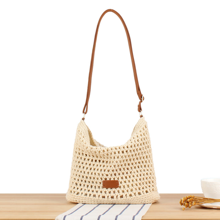 Handbag made of hand-knotted natural material with leather accents Bowlift