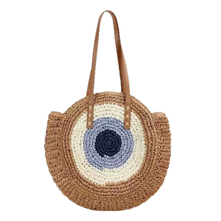 Braided basket bag with unique round design and elegant shoulder straps Bowlift