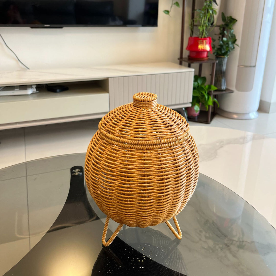 Women artfully woven storage pot Bowlift