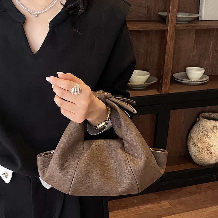 Designer Handbag Bowlift