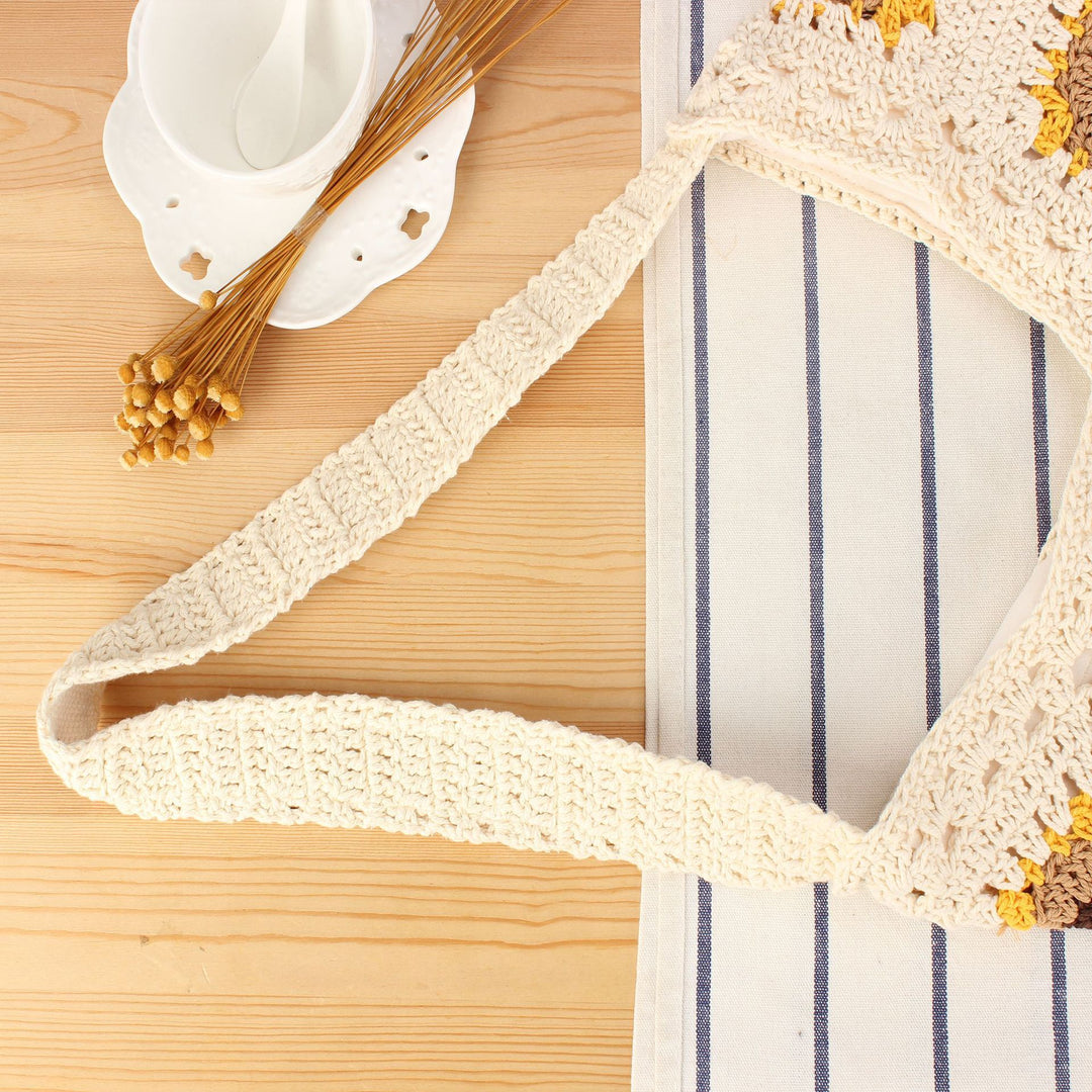 Crochet shoulder bag with playful sunflower pattern Bowlift