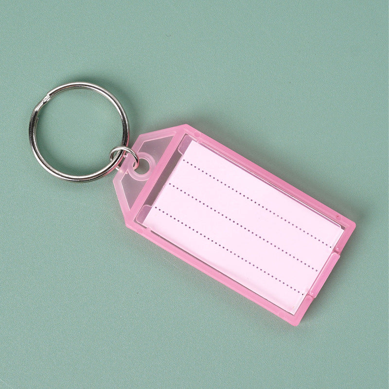 Unisex keychain with reusable label field Bowlift