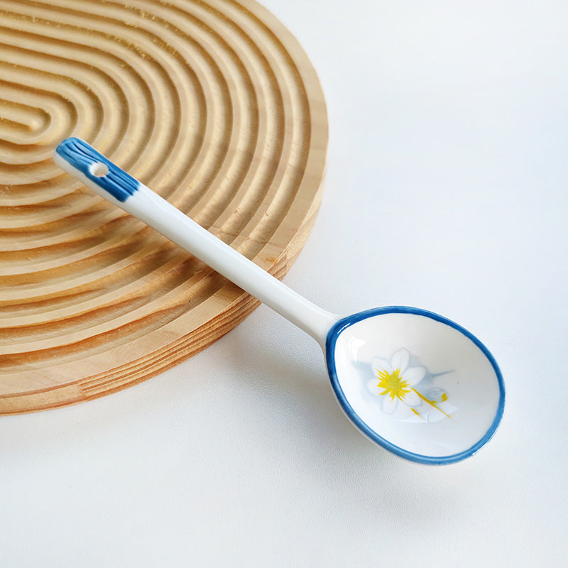 Ceramic soup spoon with lucky cat illustration and ergonomic long-handle Bowlift