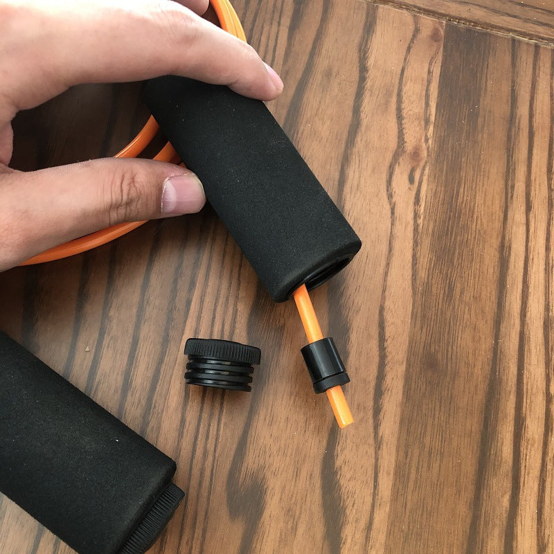 Jump rope with non-slip grips and adjustable cord Bowlift