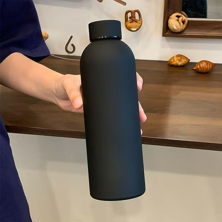 Unisex double-walled stainless steel water bottle with matte powder coating, non-slip surface and leak-proof screw cap Bowlift
