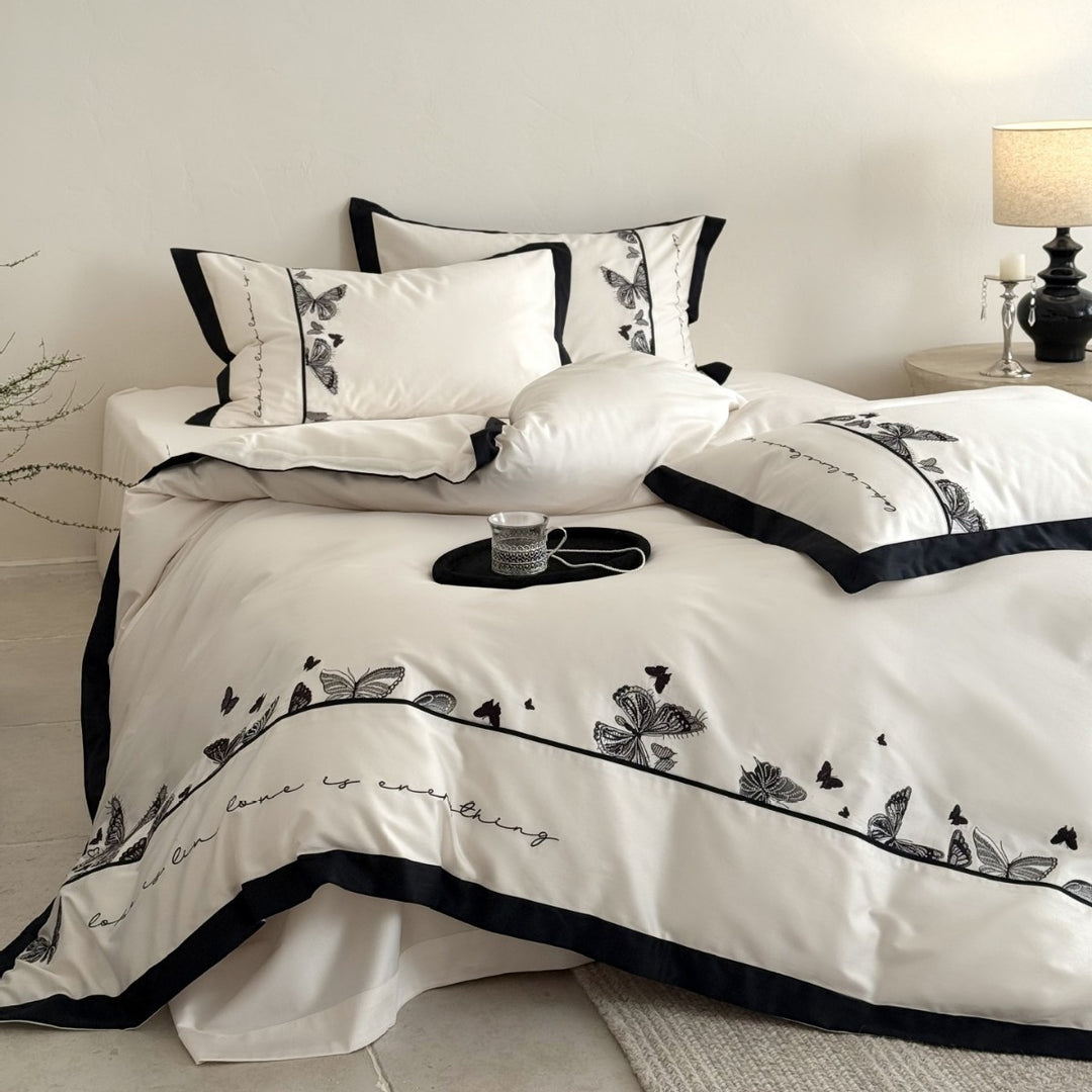 Luxurious cotton satin bedding set with butterfly embroidery and contrasting piping Bowlift