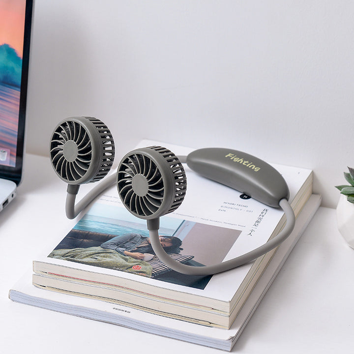 Unisex portable neck fan with dual fan heads, flexible neckband, quiet brushless motor, and USB charging function Bowlift