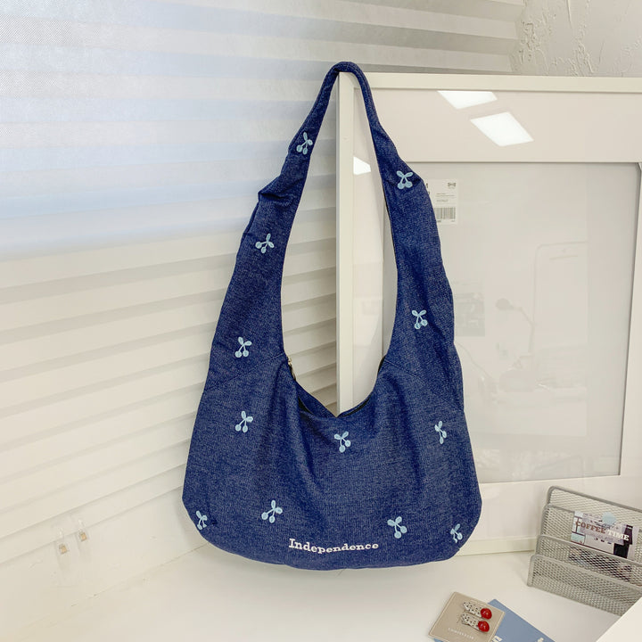 Comfortable shoulder bag with original embroidery motif Bowlift