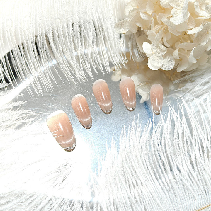 Artificial nails with elegant gloss and glitter accents Bowlift