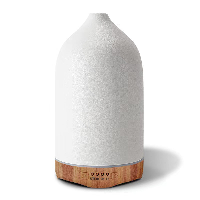 Ultrasonic essential oil diffuser with wood grain base and matte textured ceramic cover Bowlift