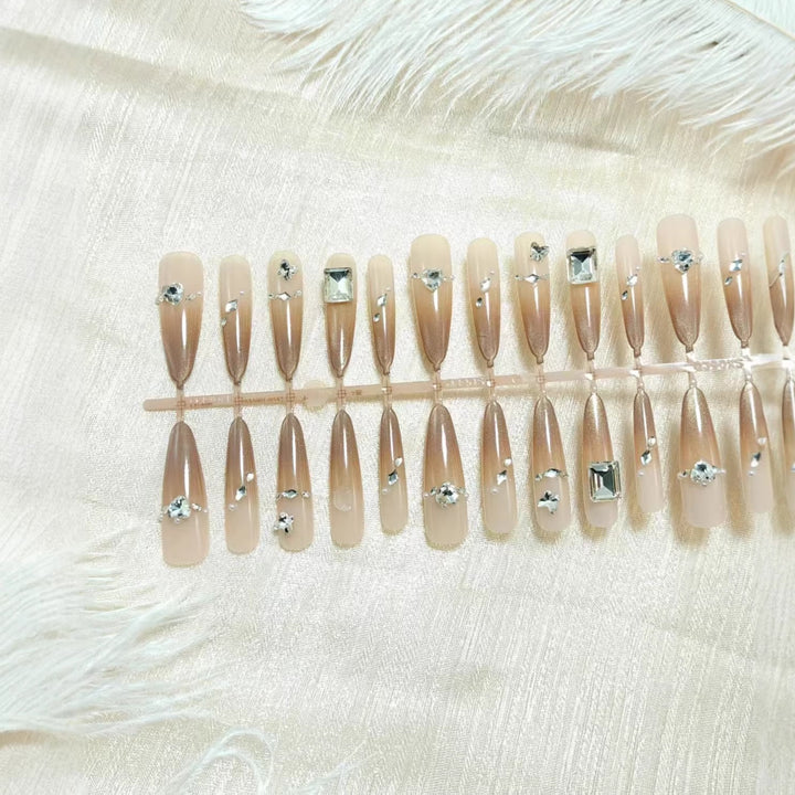 Acrylic nail set with glamorous 3D rhinestone applications Bowlift