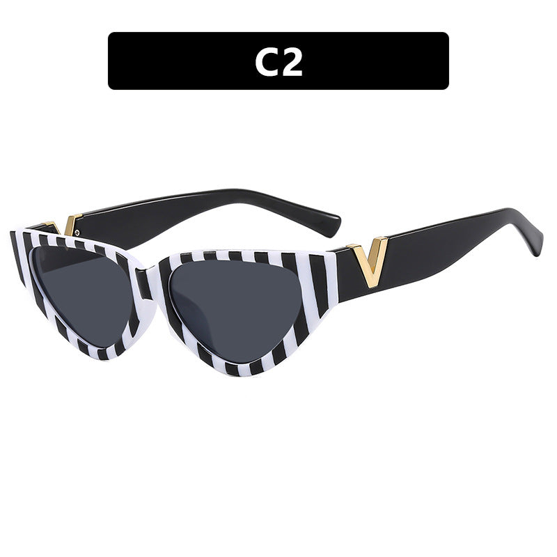 Women's Cat-Eye Sunglasses with Stylish Zebra Design and Luxurious Accents Bowlift