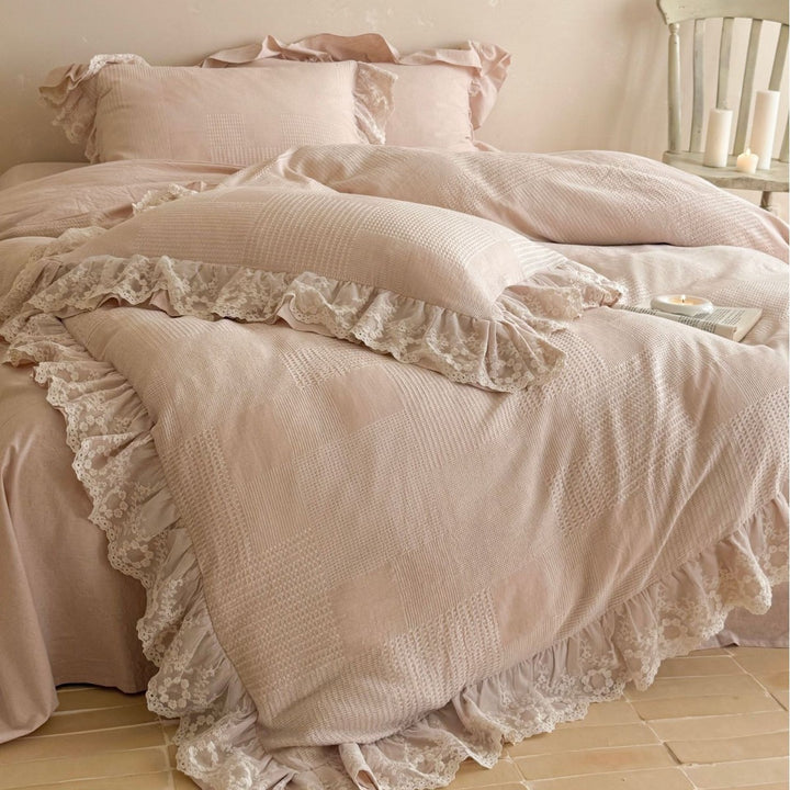 Cotton waffle bedding with floral lace ruffle and wavy hem