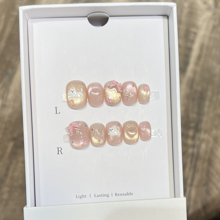 Whimsical Press-On Nail Art Set with Playful Character Designs Bowlift