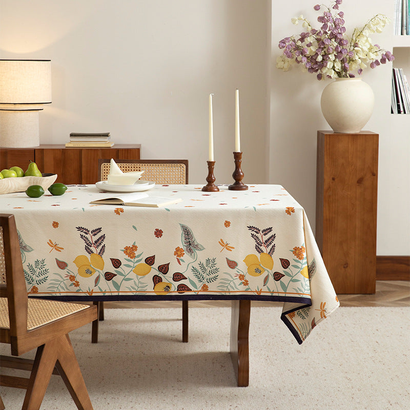 Tablecloth made of cotton blend with floral border illustration and reinforced hem Bowlift
