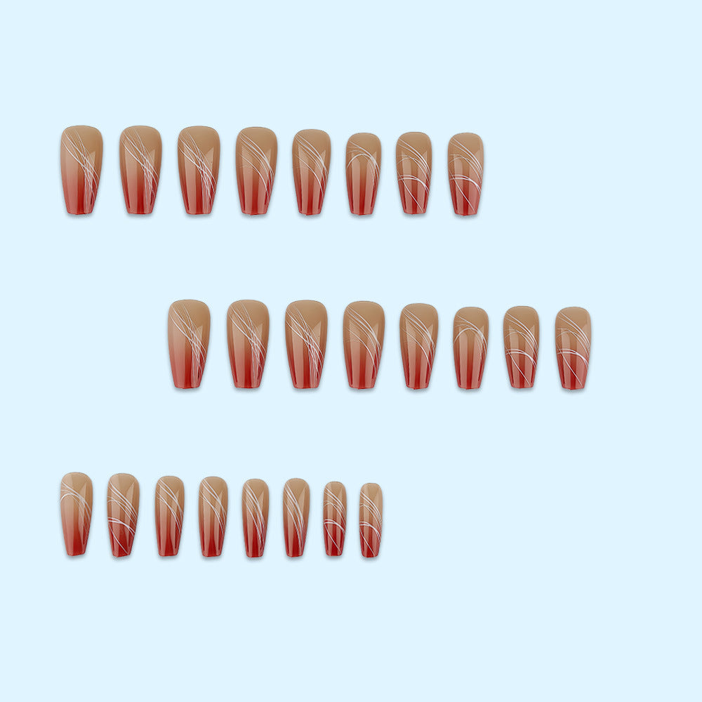Artificial nails in elegant ombre design with fine lines Bowlift