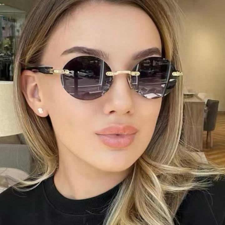 Women's round sunglasses with elegant wooden frame and UV protection Bowlift