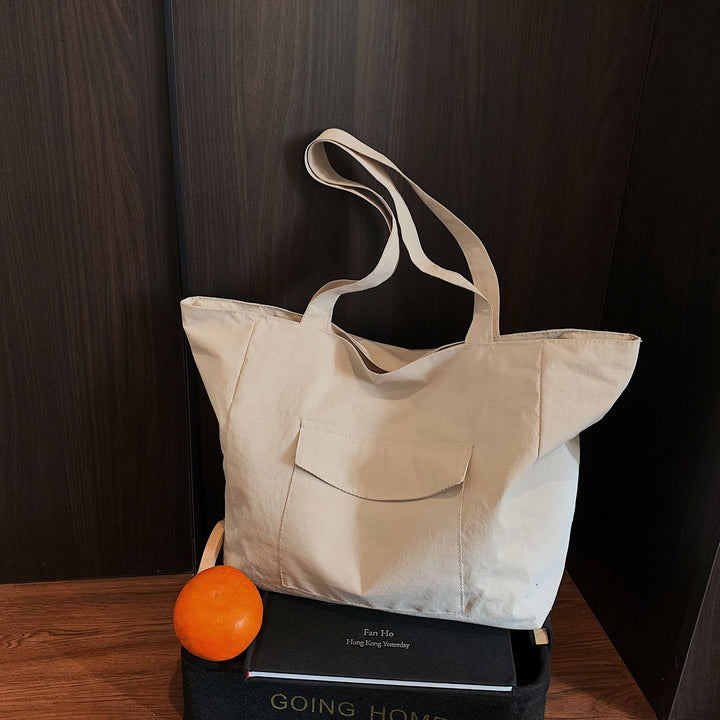 Spacious shopping bag with practical front pocket Bowlift