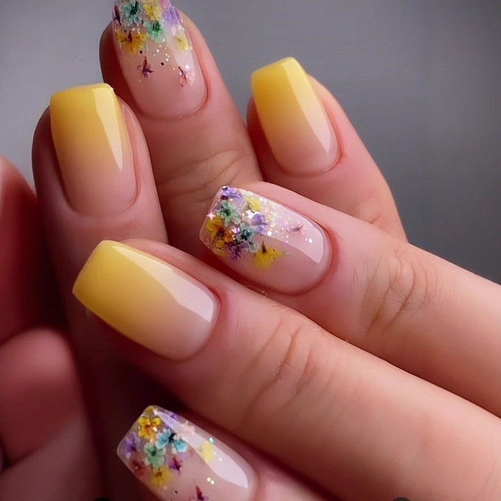 Artificial nails in elegant French tip design Bowlift