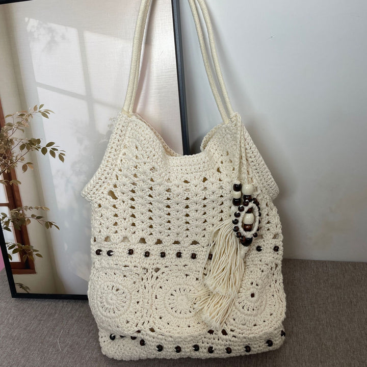 Hand-crocheted shoulder bag with unique fringe design Bowlift