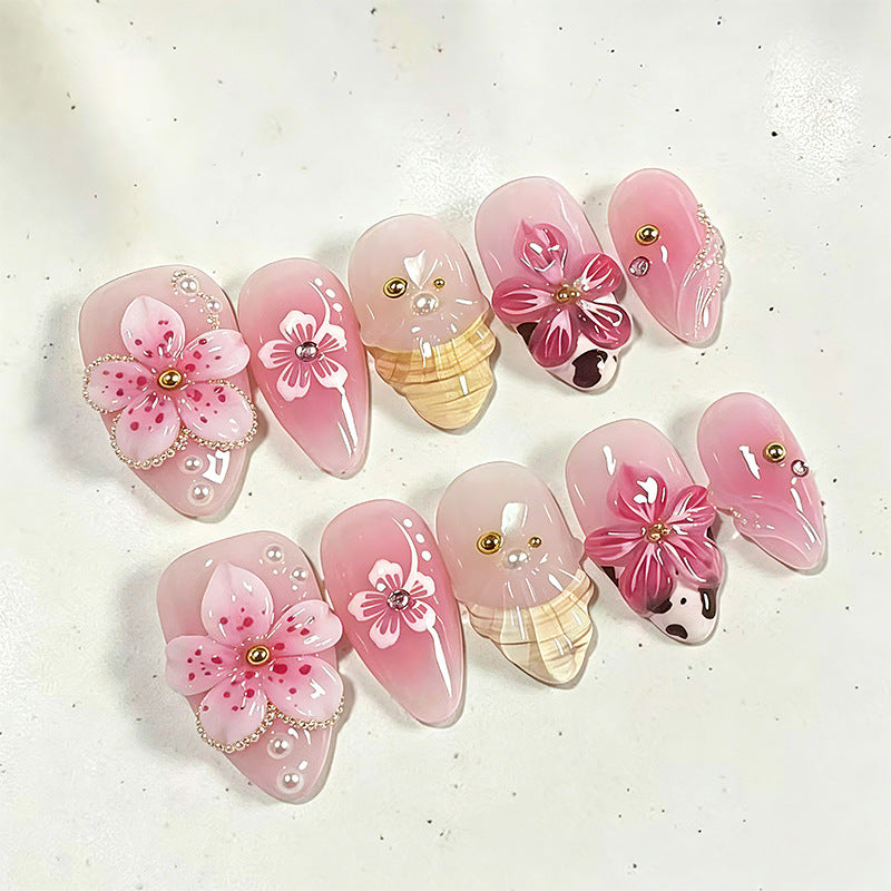 Artificial nail set with elegant floral accents Bowlift