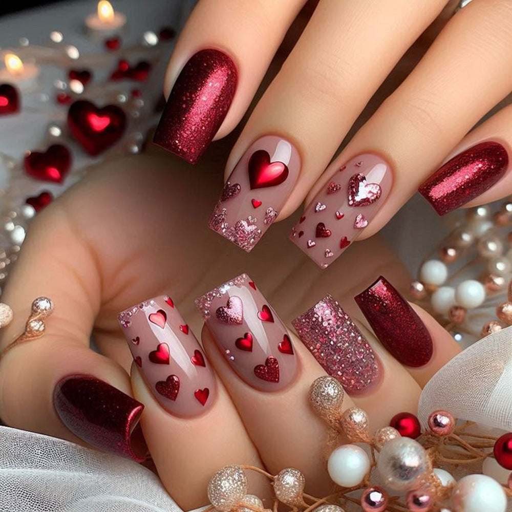 Artificial nails with heart design and glitter Bowlift
