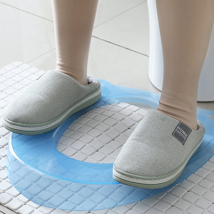 Padded toilet seat reducer with non-slip grips Bowlift