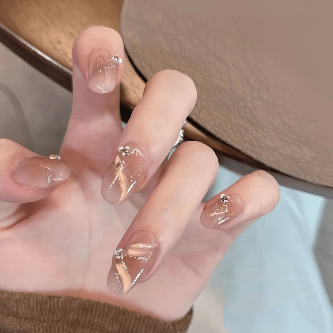Artificial nails with elegant rhinestone accents Bowlift