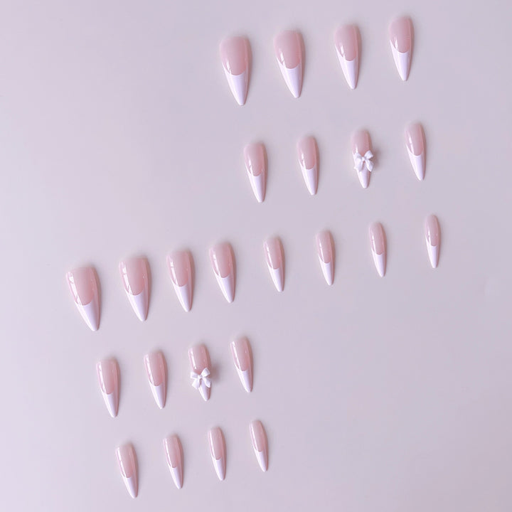 Acrylic nail set with elegant tips and 3D decorations Bowlift