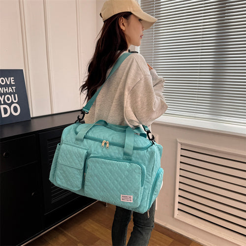 Spacious Quilted Weekend Duffle Bag Bowlift