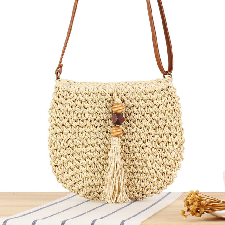 Braided shoulder bag with tassels and wooden decorations Bowlift