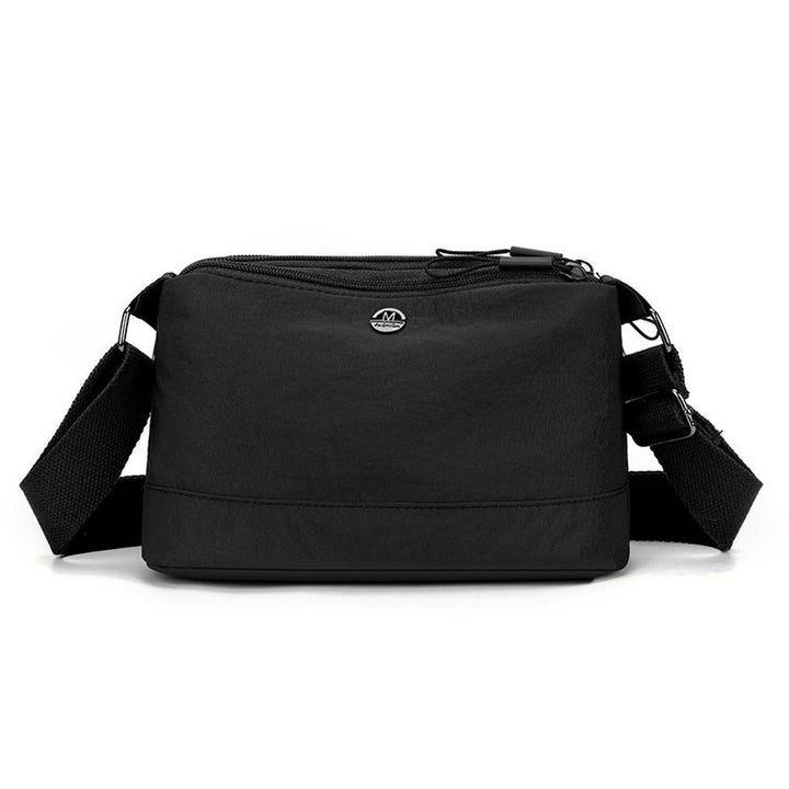 Shoulder bag with adjustable carrying strap and intelligent compartment system Bowlift